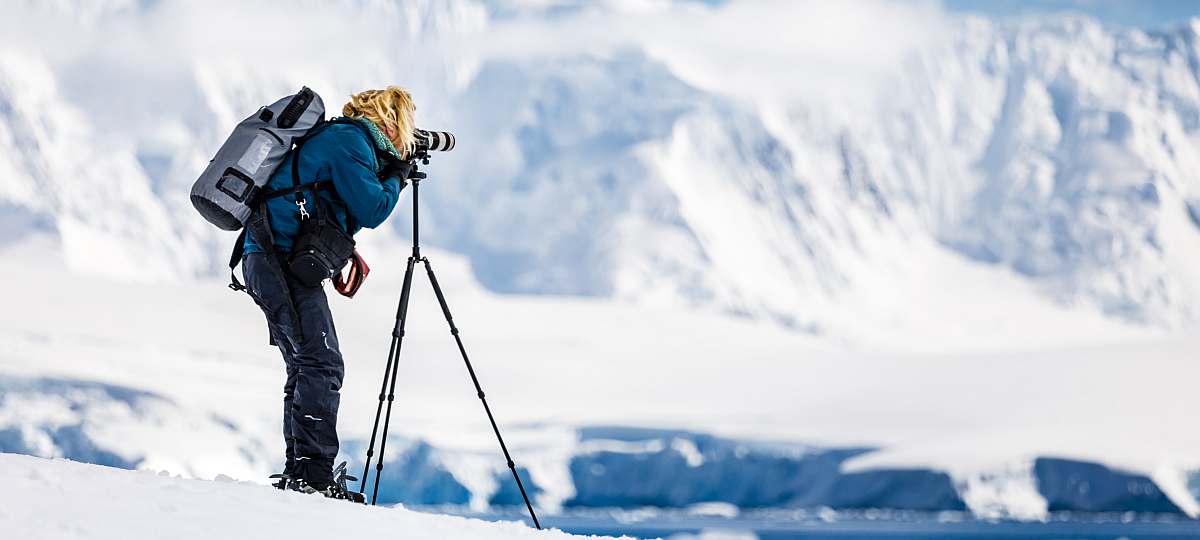 OTL-Passenger taking pictures at Damoy Island, Antarctica © Max Draeger - Oceanwide Expeditions.jpg_Max Draeger-small.jpg